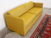 Yellow_sofa_in_Scandinavian_design_from_2000s