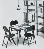 Table_and_4_chairs_set_by_Achille_&_Pier_Giacomo_Castiglioni,_1965.