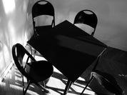 Table_and_4_chairs_set_by_Achille_&_Pier_Giacomo_Castiglioni,_1965.