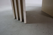 Travertine_dining_table_with_sculptural_base,_Italy_1960s