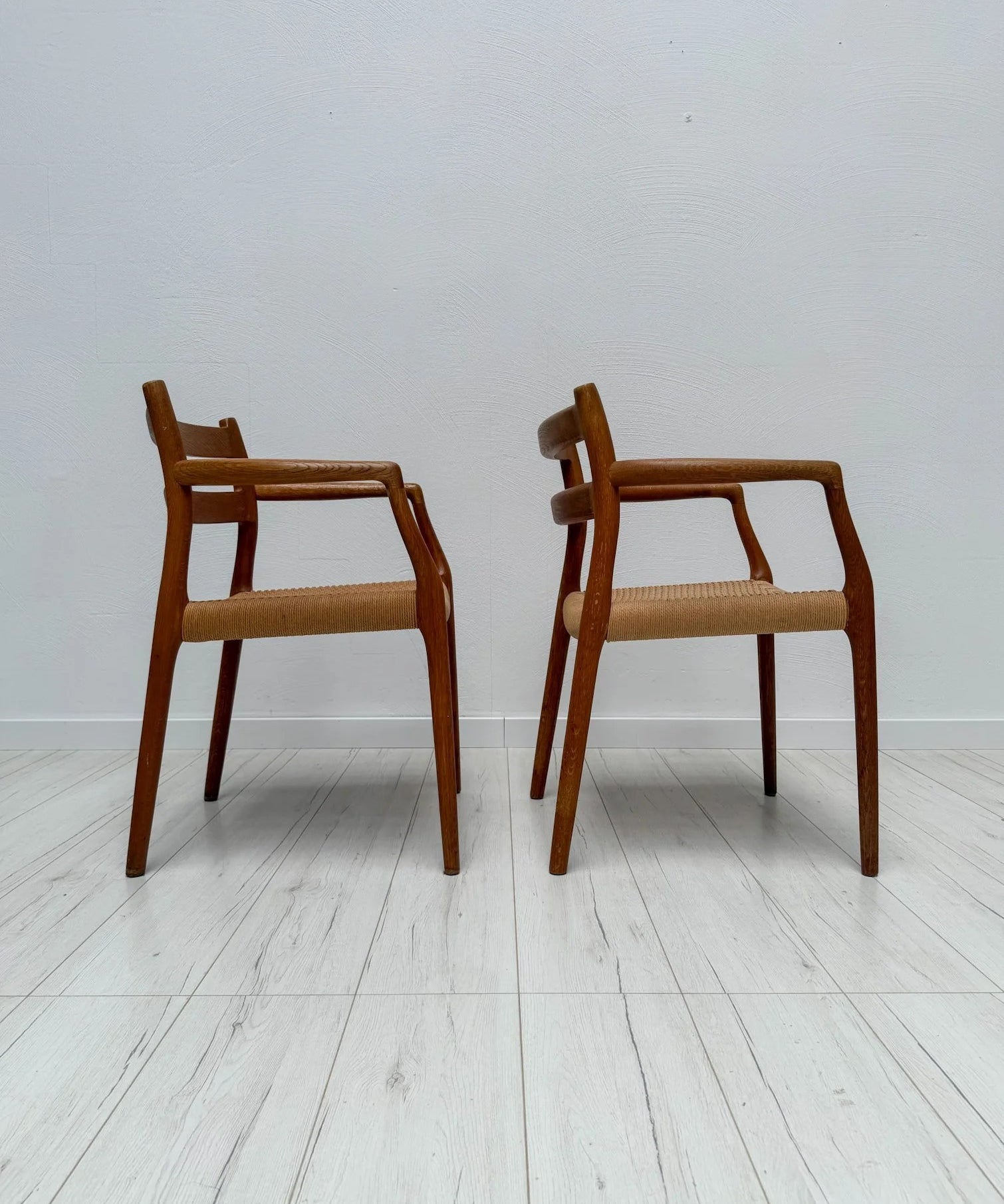 Model_67_Teak_Dining_Armchair_by_Niels_Otto_Møller_for_J.L._Møllers_Møbelfabrik,_Original_Papercord,_Denmark,_1960s