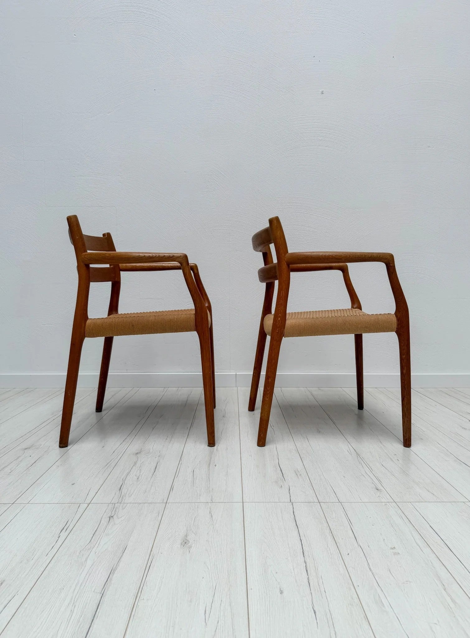 Model_67_Teak_Dining_Armchair_by_Niels_Otto_Møller_for_J.L._Møllers_Møbelfabrik,_Original_Papercord,_Denmark,_1960s