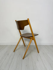 Vintage_Stackable_Plywood_Chairs_by_Hiller,_Bauhaus-Inspired_Mid-Century_Modern_Design,_1950s–1960s