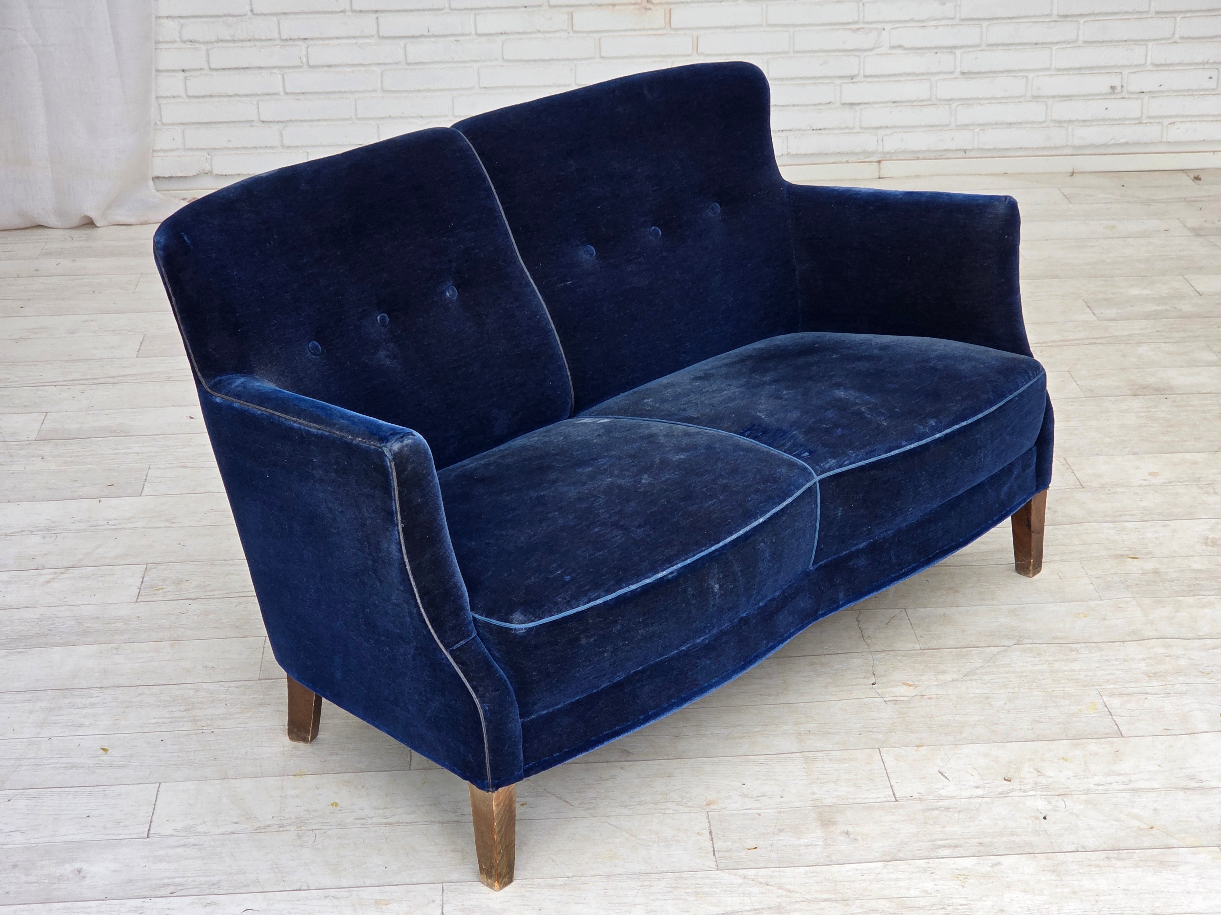 Danish_Two-Seater_Sofa_in_Dark_Blue_Velour_and_Ash_Wood,_Denmark,_1960s