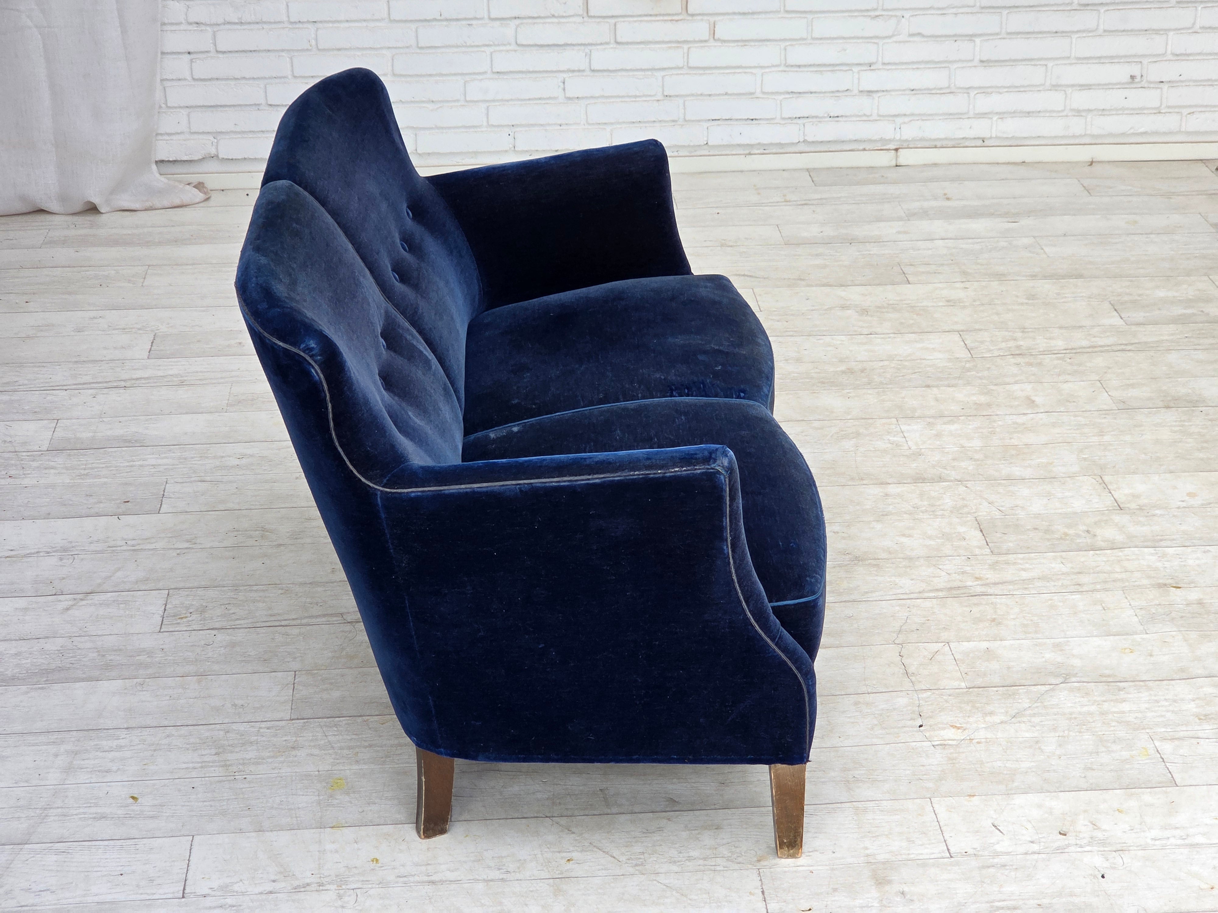 Danish_Two-Seater_Sofa_in_Dark_Blue_Velour_and_Ash_Wood,_Denmark,_1960s