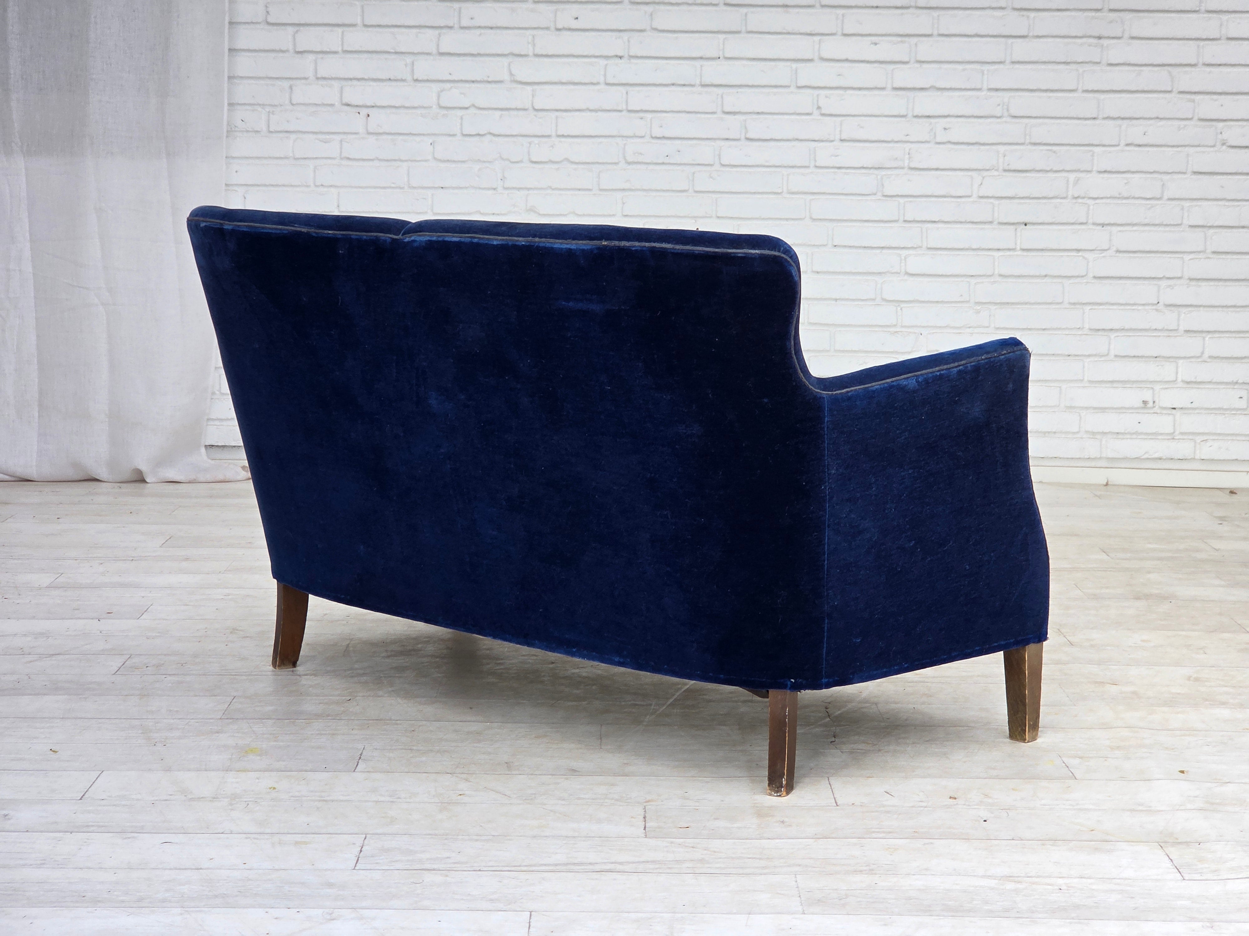 Danish_Two-Seater_Sofa_in_Dark_Blue_Velour_and_Ash_Wood,_Denmark,_1960s