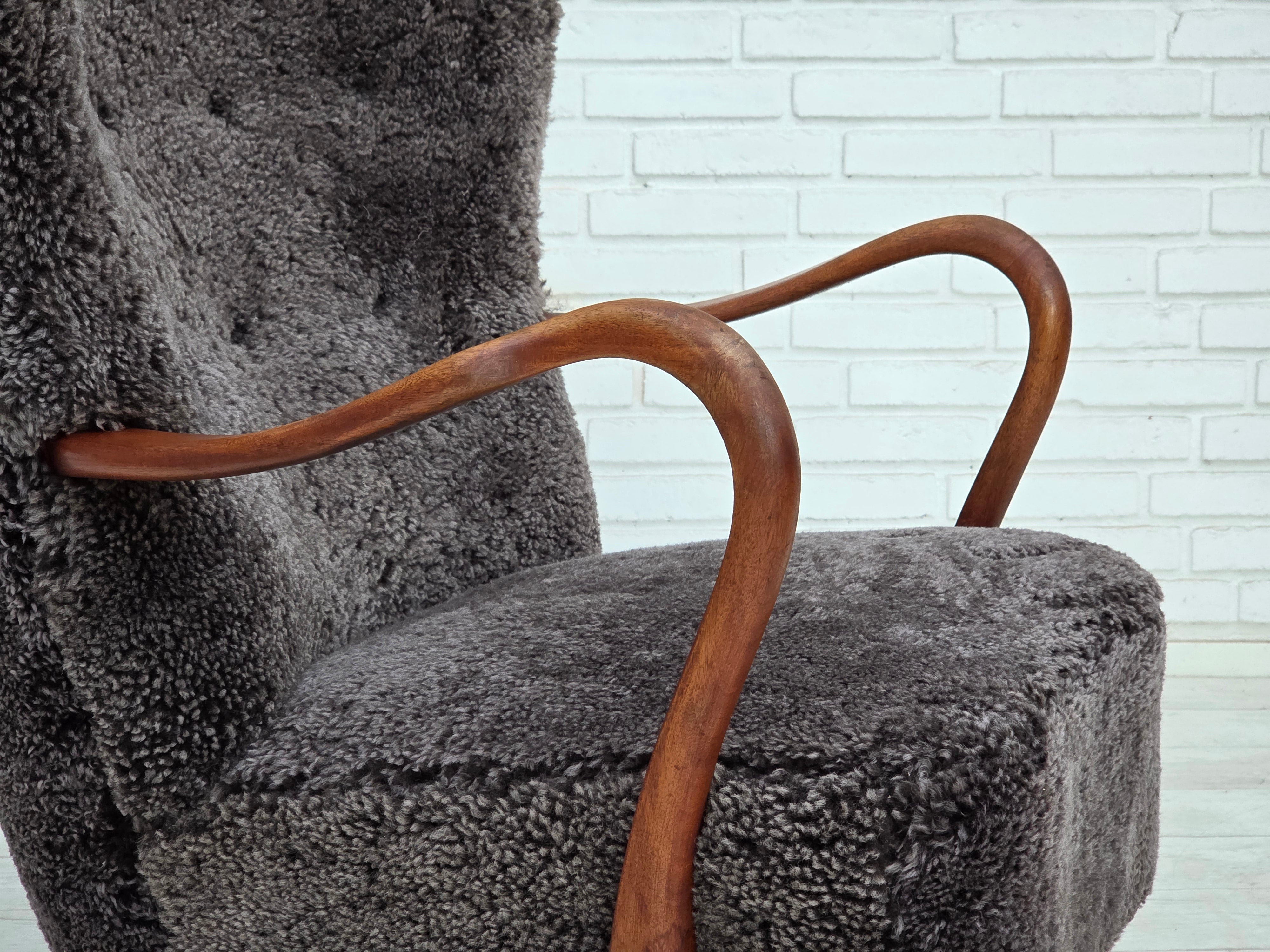 Danish_Mid-Century_Modern_Armchair_in_Genuine_Sheepskin,_Teak_and_Brass,_Denmark,_1960s