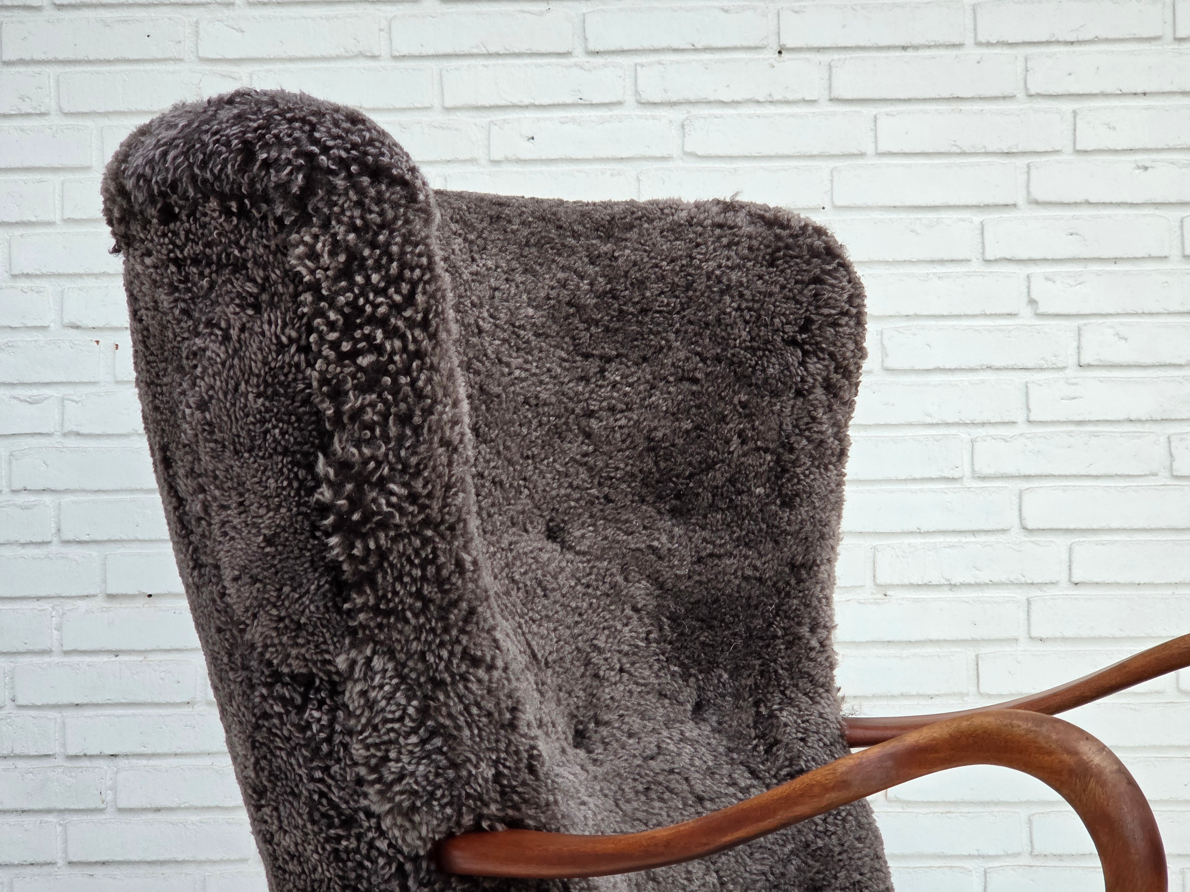 Danish_Mid-Century_Modern_Armchair_in_Genuine_Sheepskin,_Teak_and_Brass,_Denmark,_1960s
