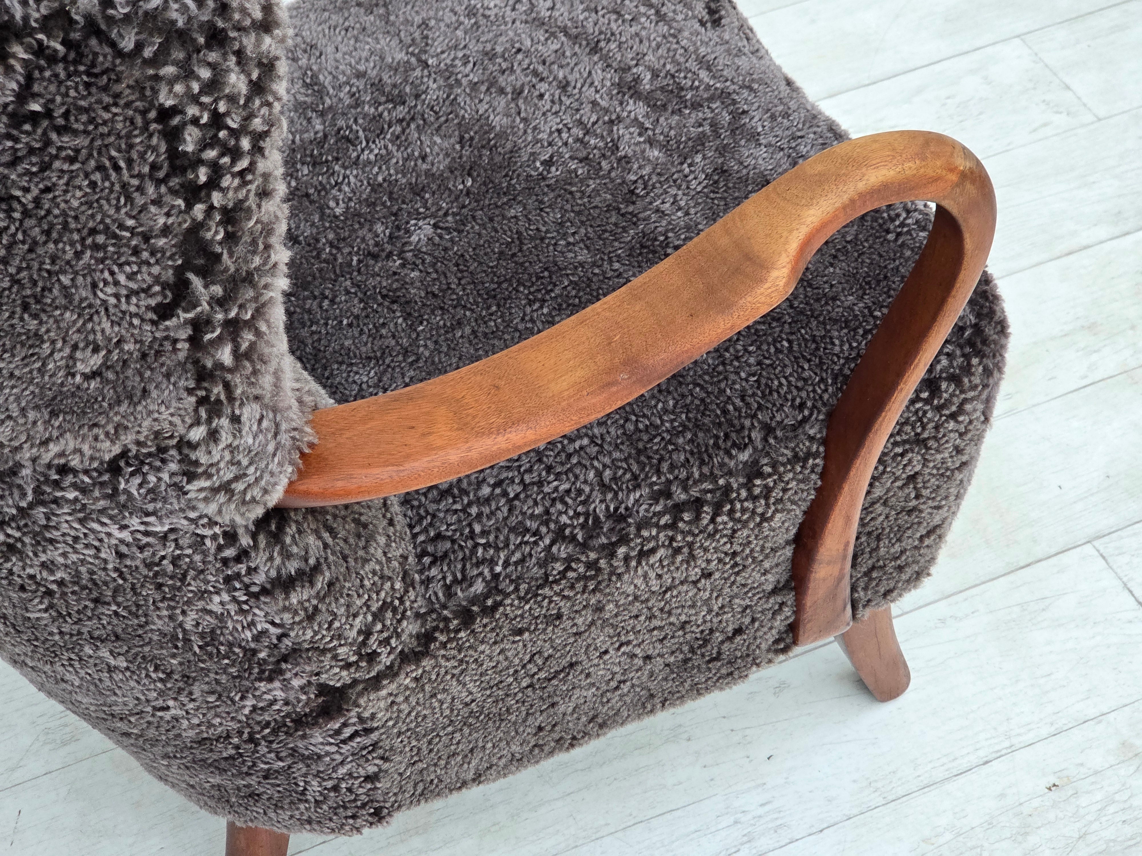 Danish_Mid-Century_Modern_Armchair_in_Genuine_Sheepskin,_Teak_and_Brass,_Denmark,_1960s