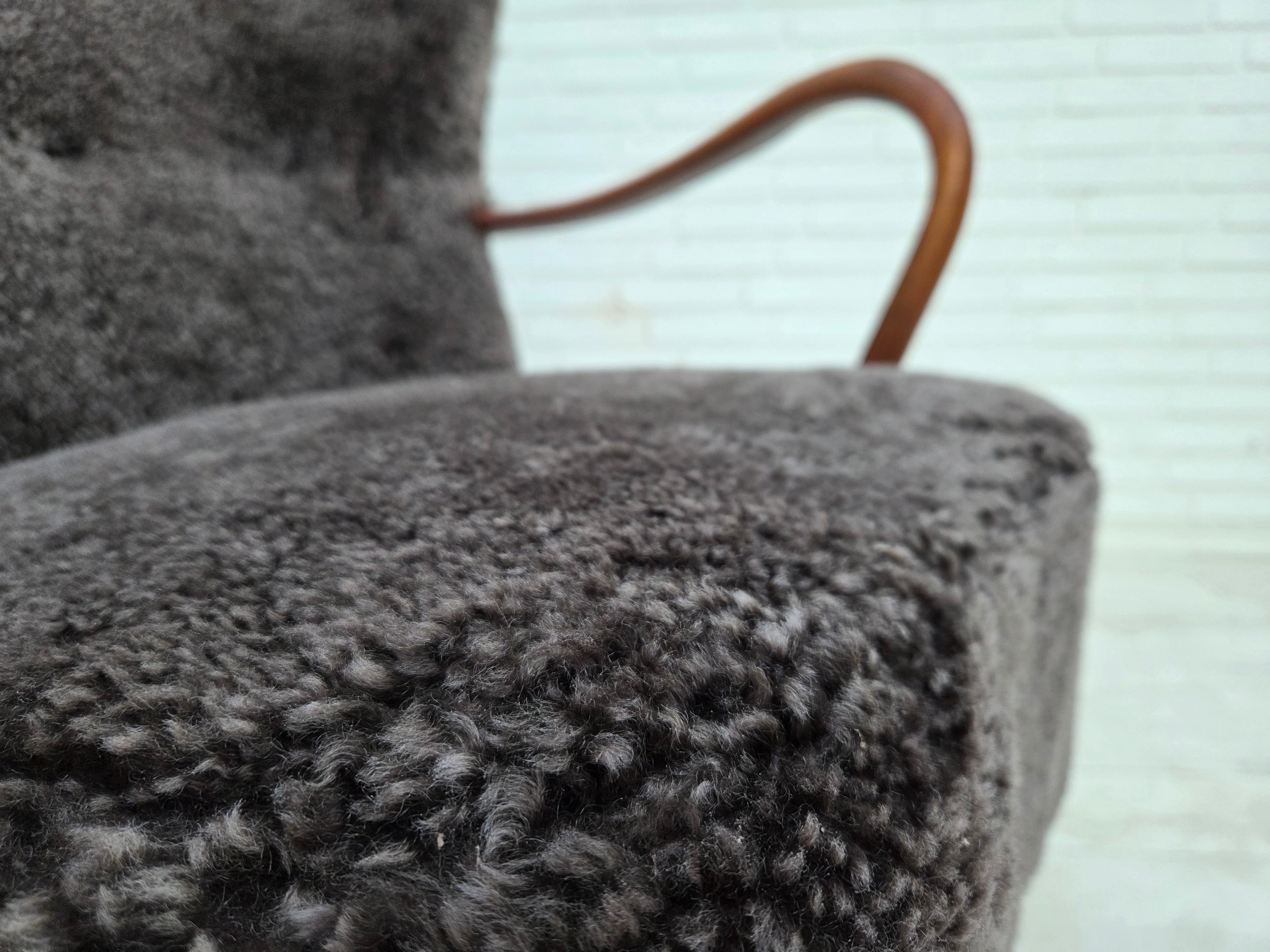 Danish_Mid-Century_Modern_Beech_Armchair_with_Genuine_Sheepskin_Upholstery_and_Leather_Buttons,_1960s