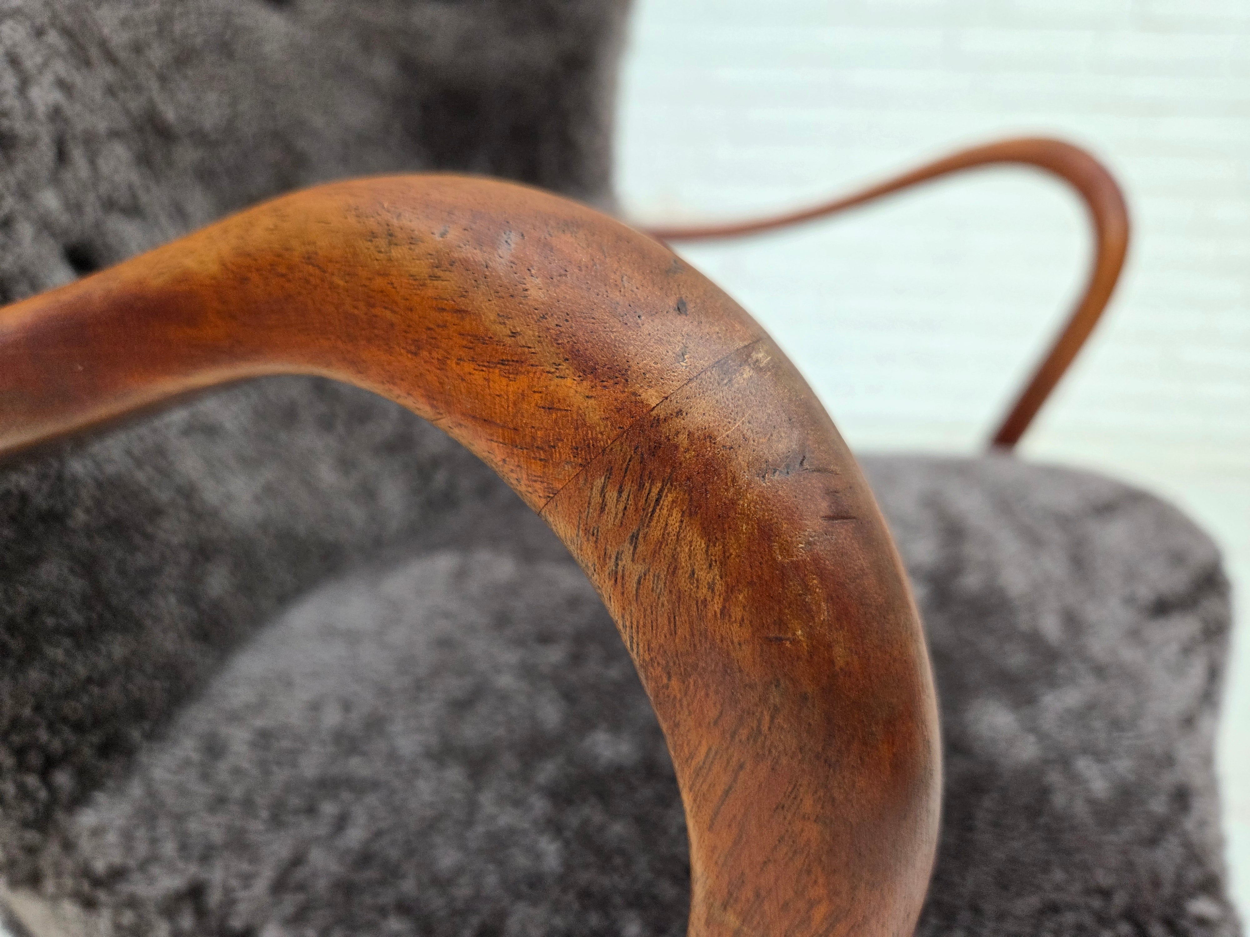 Danish_Mid-Century_Modern_Beech_Armchair_with_Genuine_Sheepskin_Upholstery_and_Leather_Buttons,_1960s