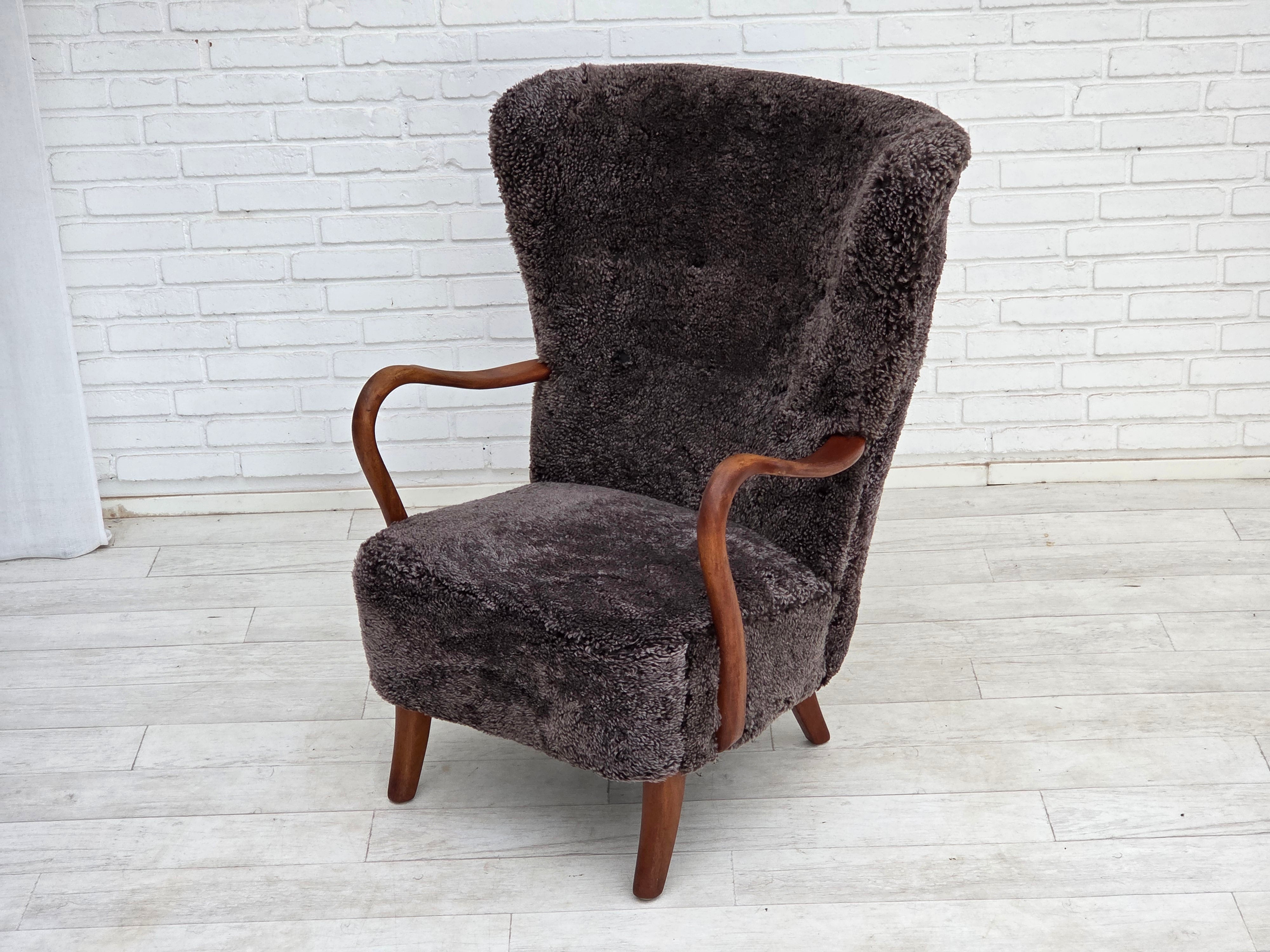 Danish_Mid-Century_Modern_Armchair_in_Genuine_Sheepskin,_Teak_and_Brass,_Denmark,_1960s