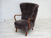 Danish_Mid-Century_Modern_Beech_Armchair_with_Genuine_Sheepskin_Upholstery_and_Leather_Buttons,_1960s