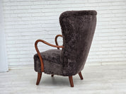 Danish_Mid-Century_Modern_Beech_Armchair_with_Genuine_Sheepskin_Upholstery_and_Leather_Buttons,_1960s