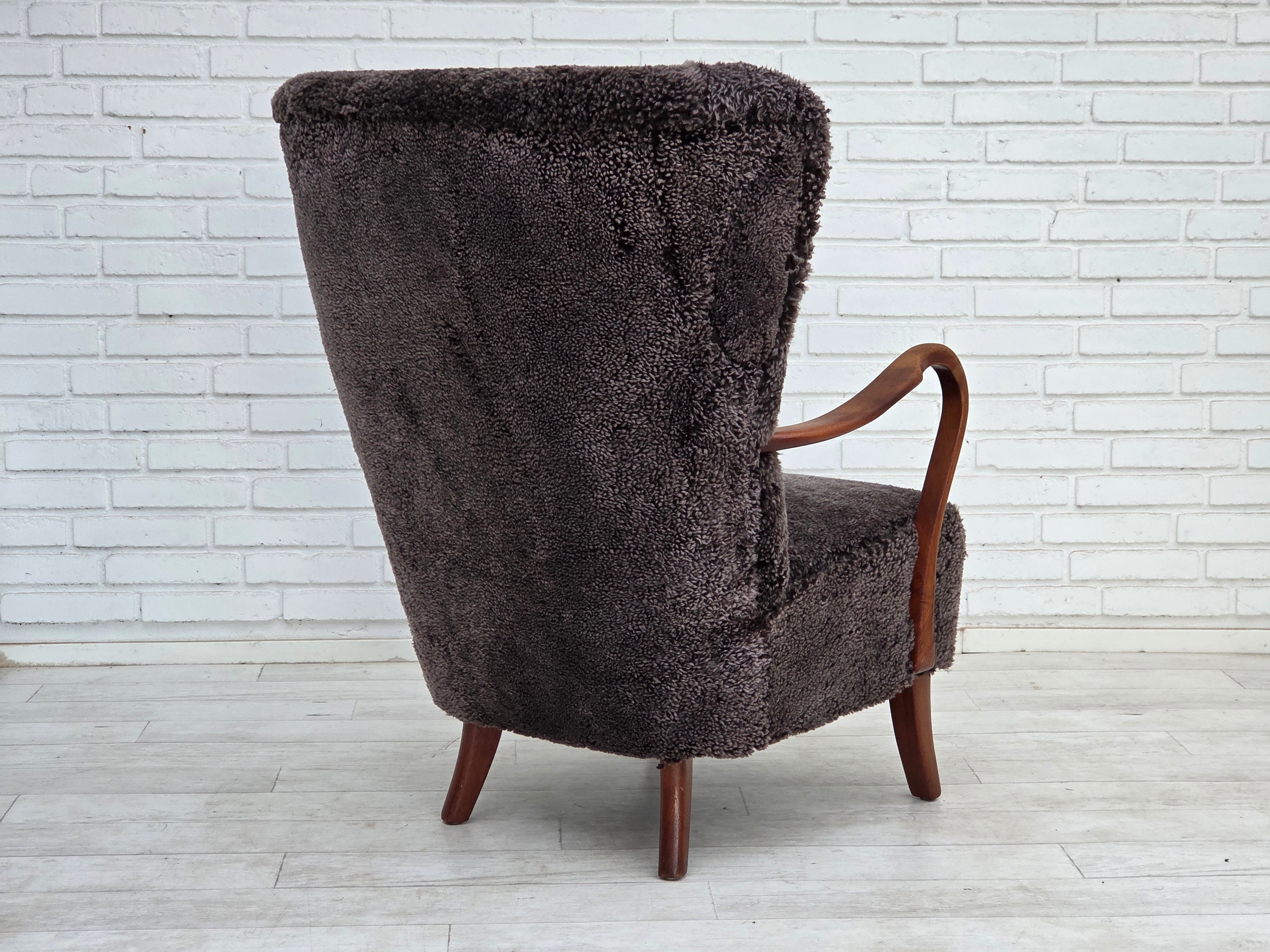 Danish_Mid-Century_Modern_Armchair_in_Genuine_Sheepskin,_Teak_and_Brass,_Denmark,_1960s
