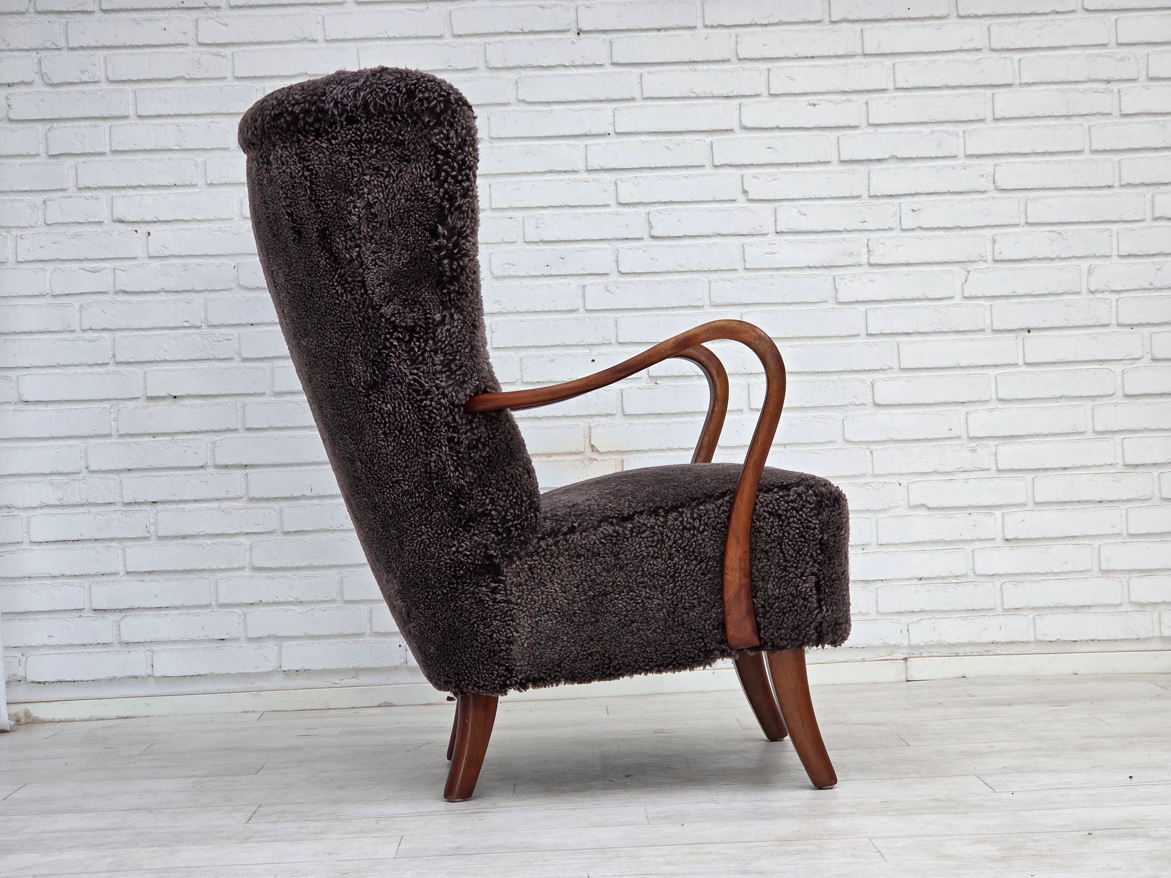 Danish_Mid-Century_Modern_Armchair_in_Genuine_Sheepskin,_Teak_and_Brass,_Denmark,_1960s