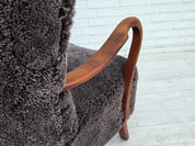 Danish_Mid-Century_Modern_Beech_Armchair_with_Genuine_Sheepskin_Upholstery_and_Leather_Buttons,_1960s