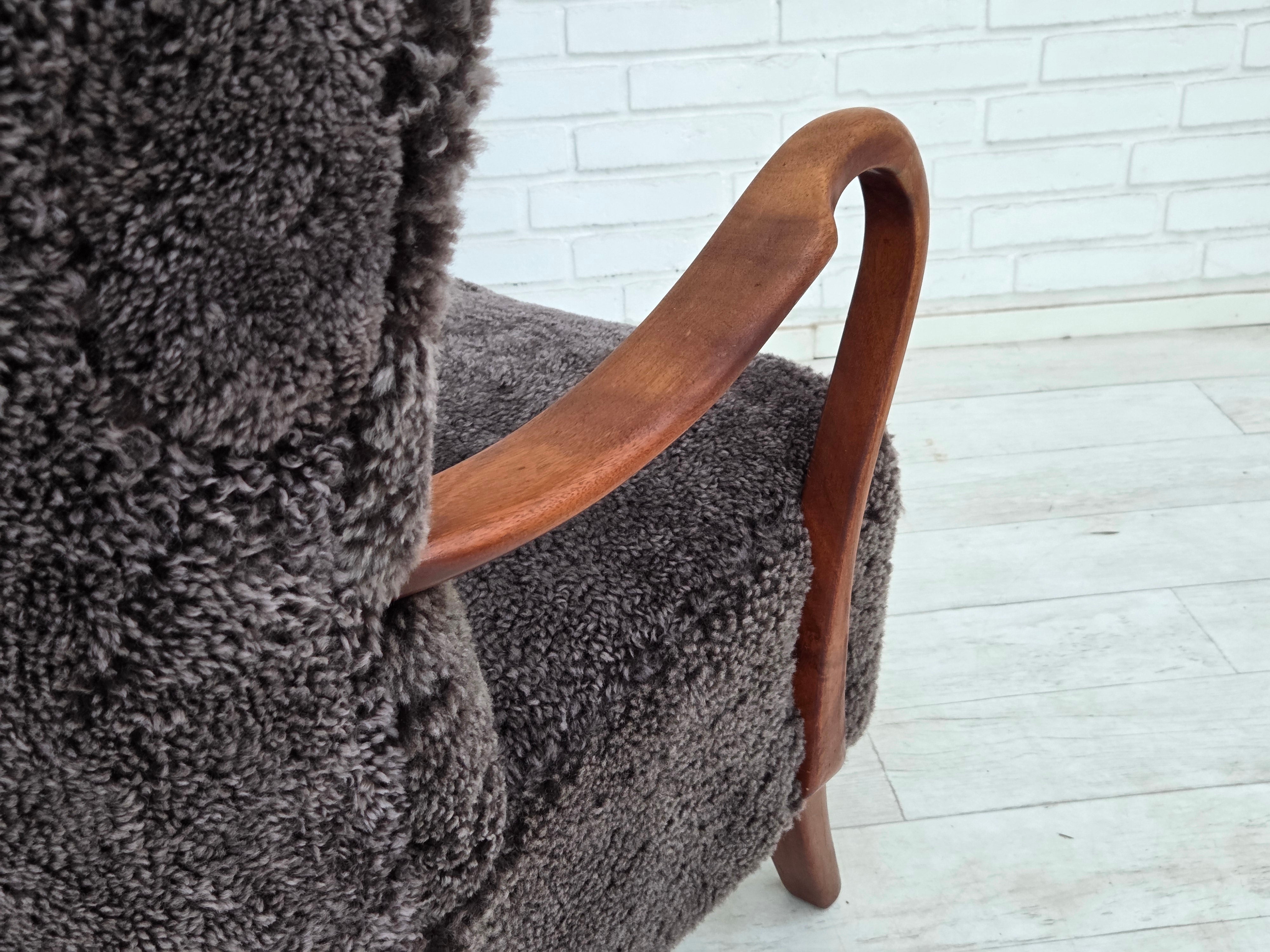 Danish_Mid-Century_Modern_Beech_Armchair_with_Genuine_Sheepskin_Upholstery_and_Leather_Buttons,_1960s