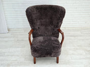 Danish_Mid-Century_Modern_Armchair_in_Genuine_Sheepskin,_Teak_and_Brass,_Denmark,_1960s