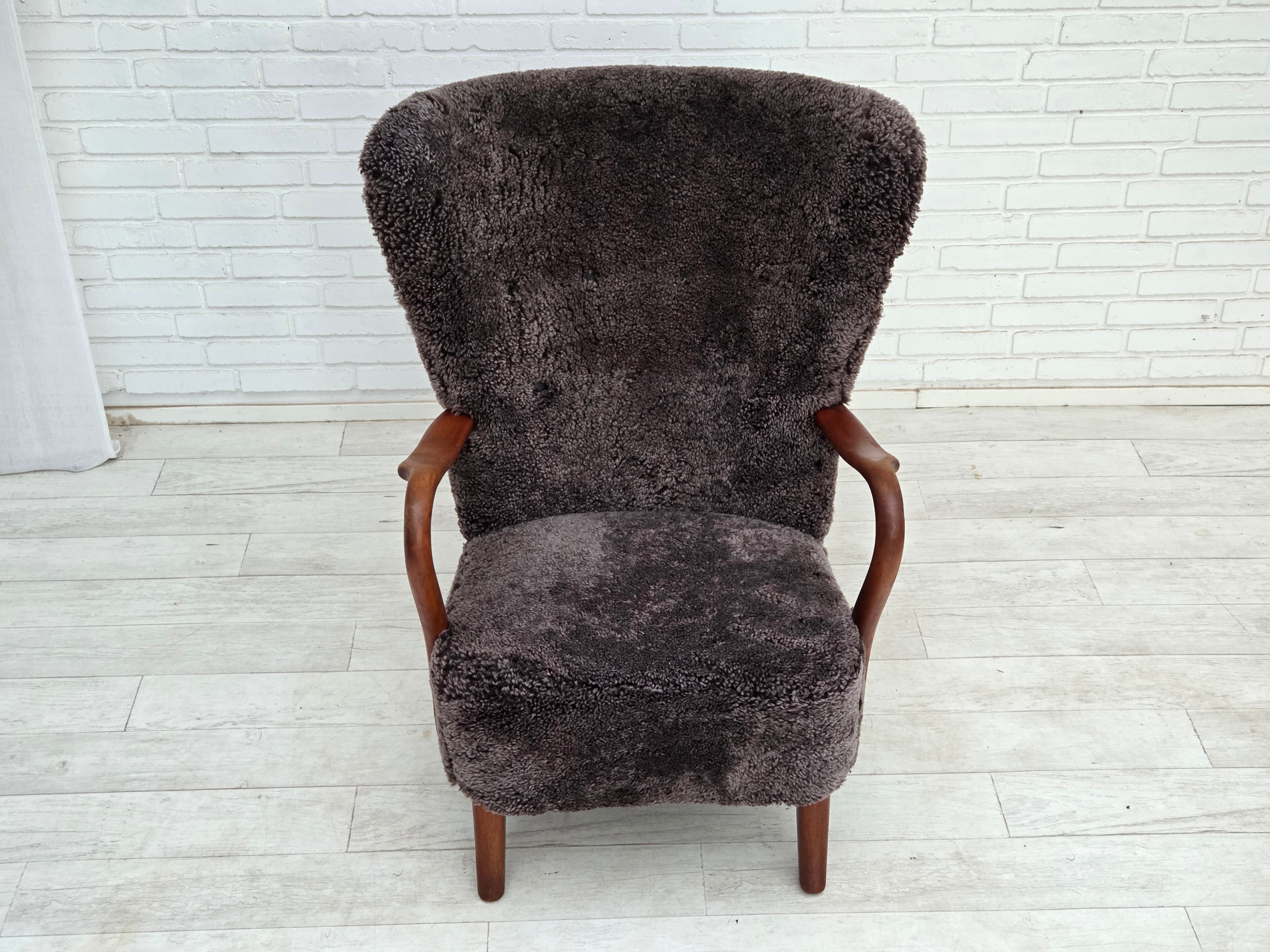 Danish_Mid-Century_Modern_Armchair_in_Genuine_Sheepskin,_Teak_and_Brass,_Denmark,_1960s