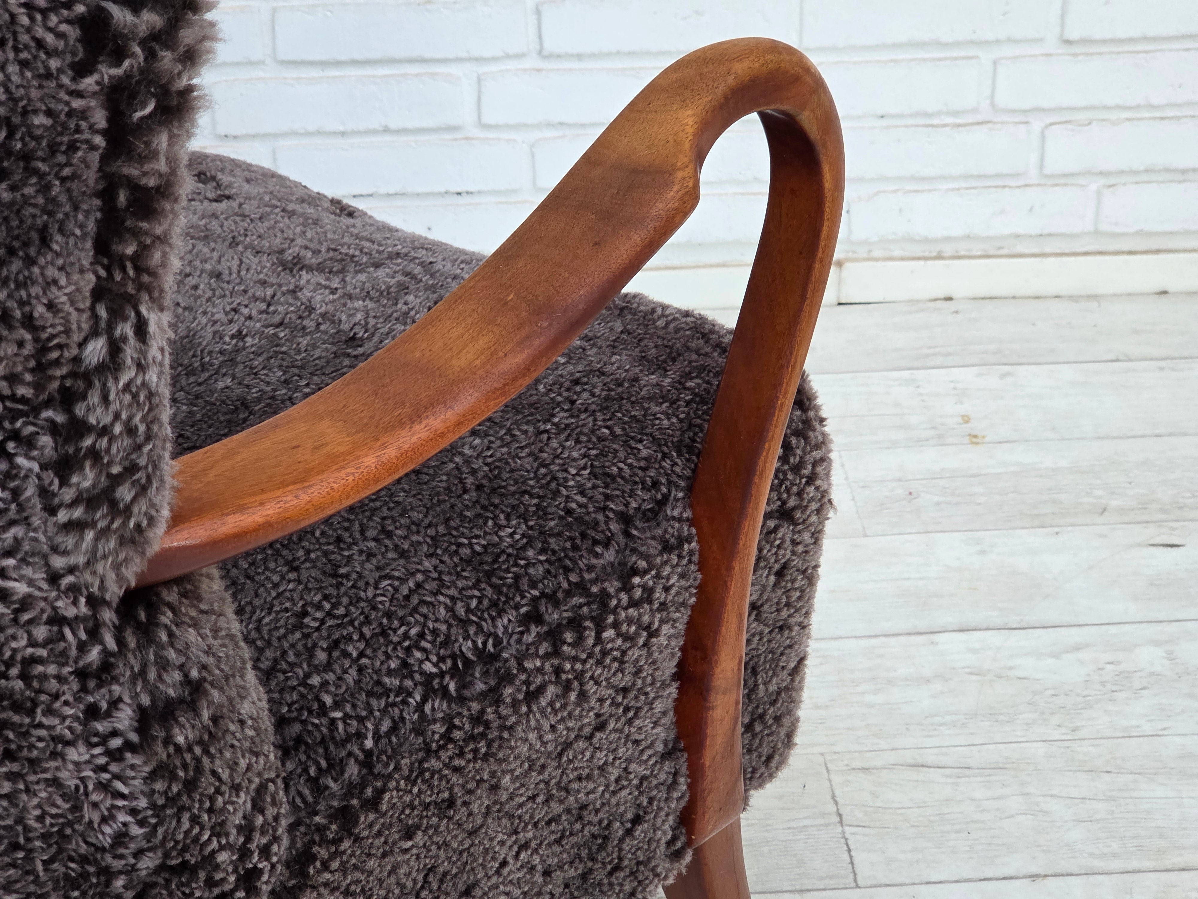 Danish_Mid-Century_Modern_Beech_Armchair_with_Genuine_Sheepskin_Upholstery_and_Leather_Buttons,_1960s