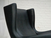 Model_110_Armchair_by_Illum_Wikkelsø_for_Søren_Willadsen,_Black_Leather_and_Teak,_Denmark,_1960s