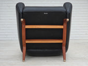Model_110_Armchair_by_Illum_Wikkelsø_for_Søren_Willadsen,_Black_Leather_and_Teak,_Denmark,_1960s