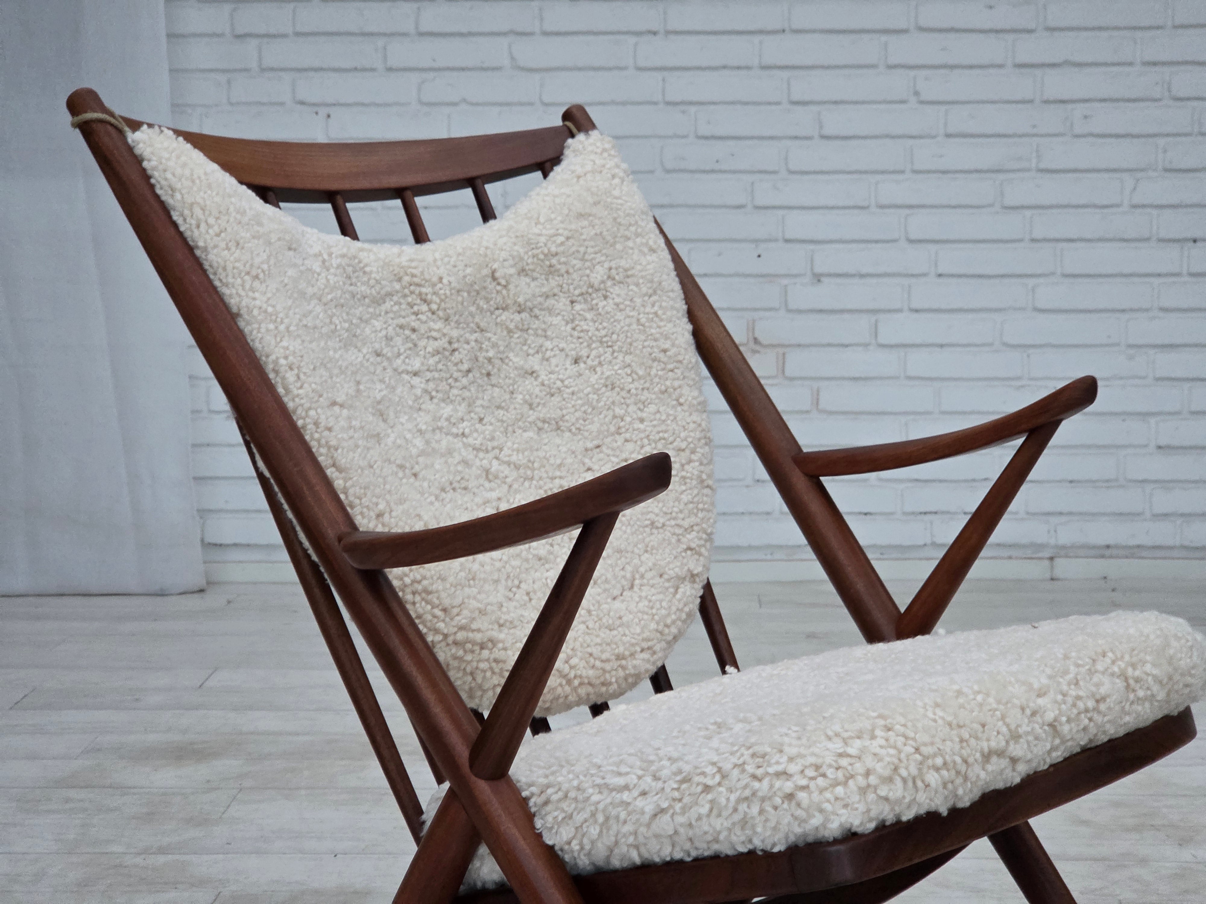 Model_182_Rocking_Chair_by_Frank_Reenskaug_for_Bramin_in_Teak_and_Sheepskin,_Denmark,_1960s