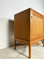 Rare_Teak_Sideboard_by_Ilse_&_Ove_Rix_for_Uldum_Møbelfabrik,_Woven_Wood_Sliding_Doors,_Denmark,_1960s