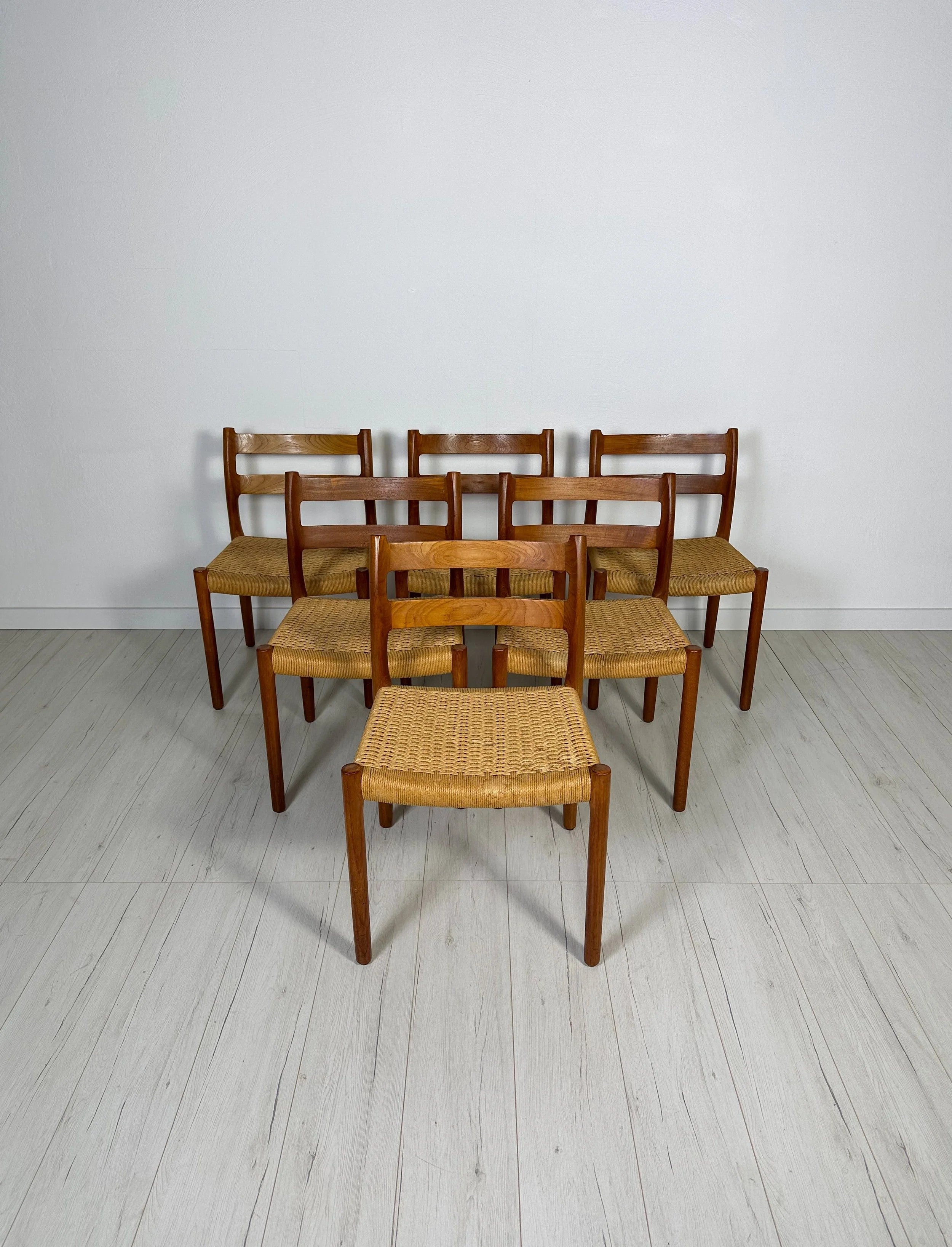 Set_of_6_Model_84_Teak_Dining_Chairs_by_Niels_Otto_Møller_for_J.L._Møller,_Papercord_Seats,_Denmark,_1960s