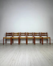 Set_of_6_Model_84_Teak_Dining_Chairs_by_Niels_Otto_Møller_for_J.L._Møller,_Papercord_Seats,_Denmark,_1960s