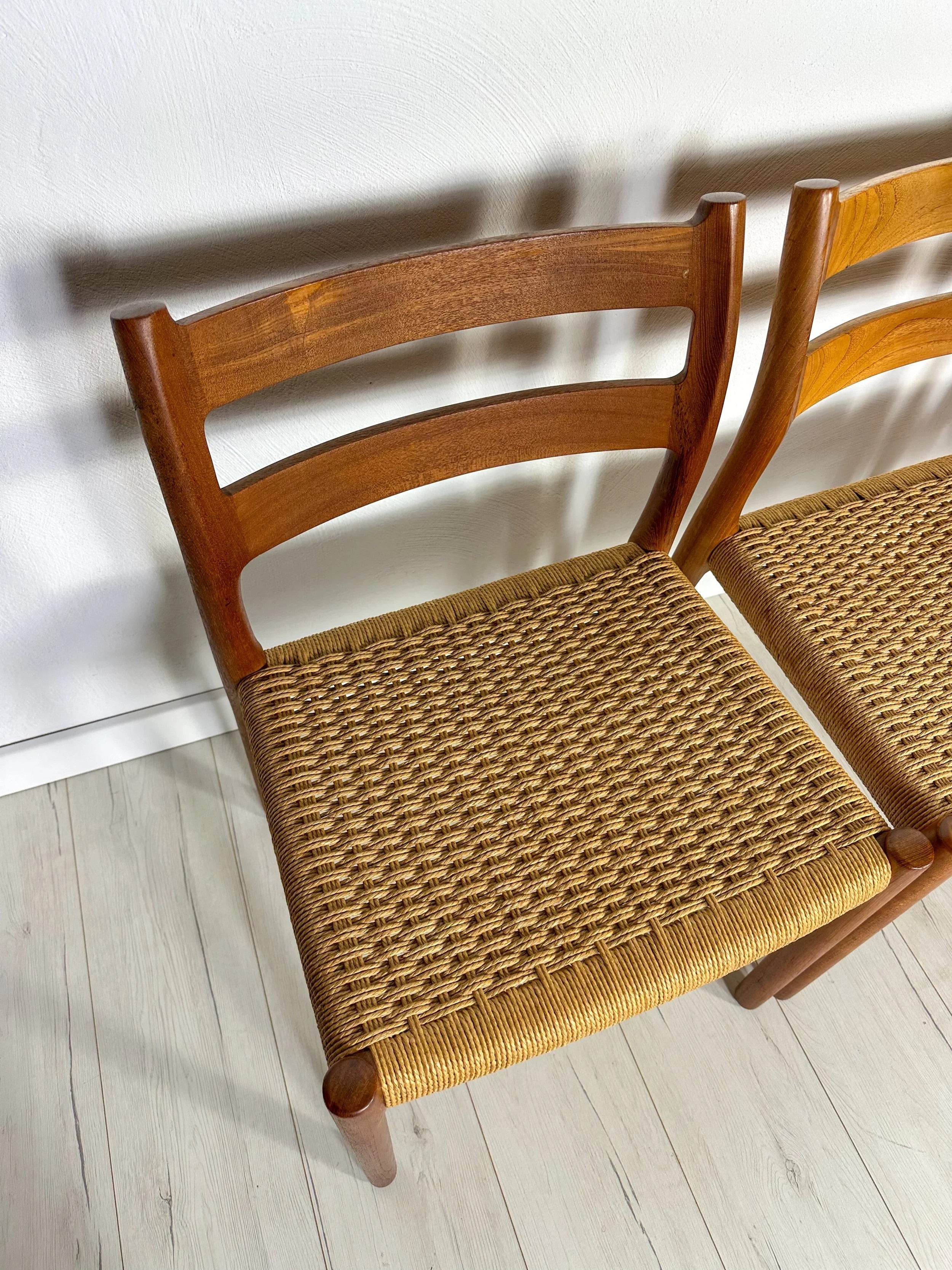 Set_of_6_Model_84_Teak_Dining_Chairs_by_Niels_Otto_Møller_for_J.L._Møller,_Papercord_Seats,_Denmark,_1960s