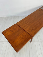 Danish_Extendable_Teak_Coffee_Table_with_Woven_Shelf_and_Pull-Out_Leaves,_Mid-Century_Modern,_1950s–1960s