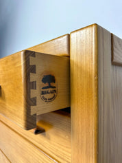 Wooden_Chest_of_Drawers_with_Leather_Handles,_Minimalist_Mid-Century_Modern_Design