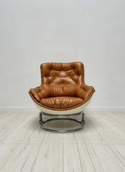 Set_of_Karate_Lounge_Chair_and_Ottoman_by_Michel_Cadestin_for_Airborne,_Cognac_Leather_and_White_Fibreglass,_France,_1960s