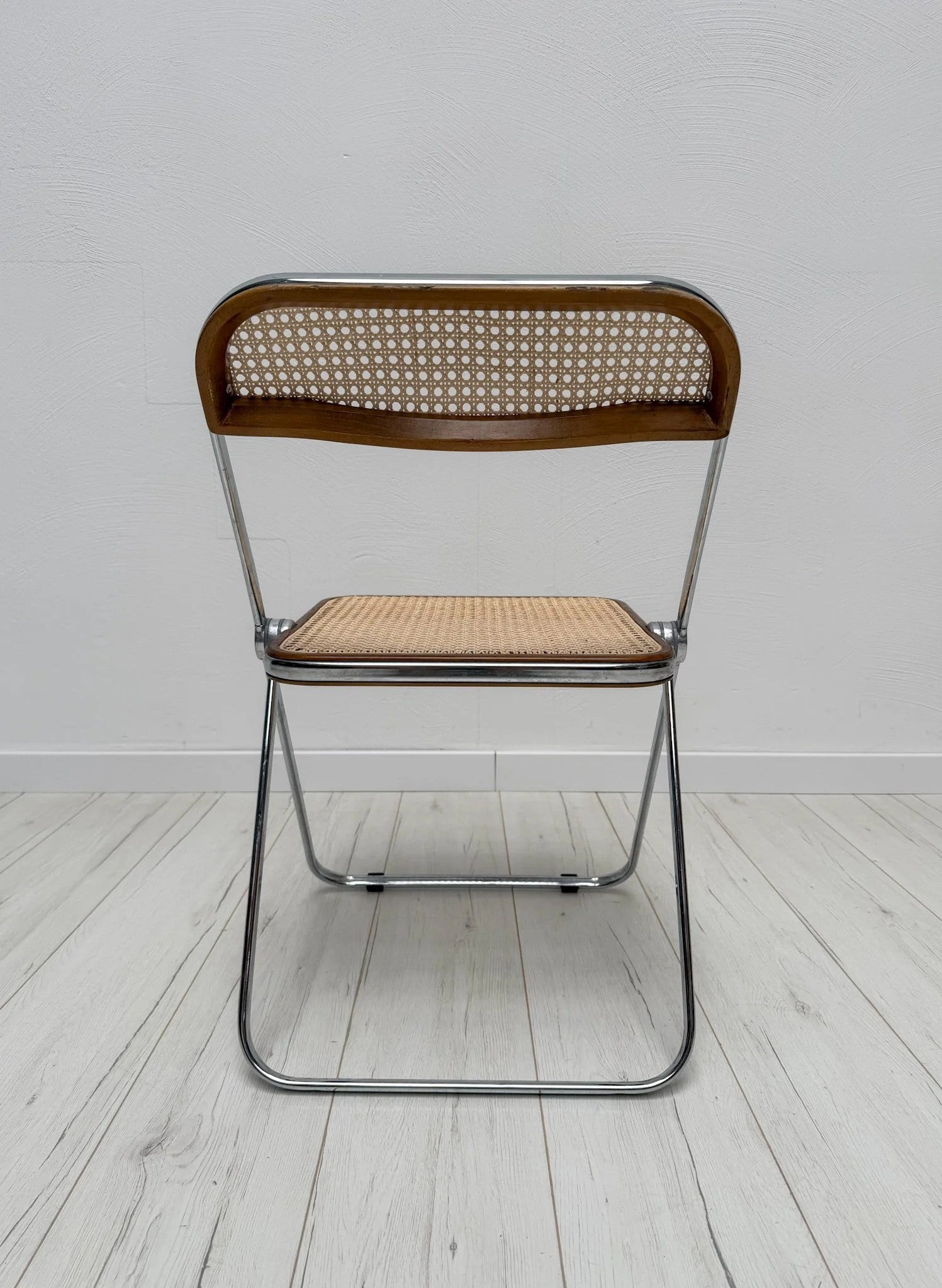 Plia_Folding_Chair_by_Giancarlo_Piretti_for_Anonima_Castelli,_Chrome,_Walnut_and_Cane_Wicker,_Italy,_1960s