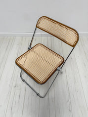 Plia_Folding_Chair_by_Giancarlo_Piretti_for_Anonima_Castelli,_Chrome,_Walnut_and_Cane_Wicker,_Italy,_1960s