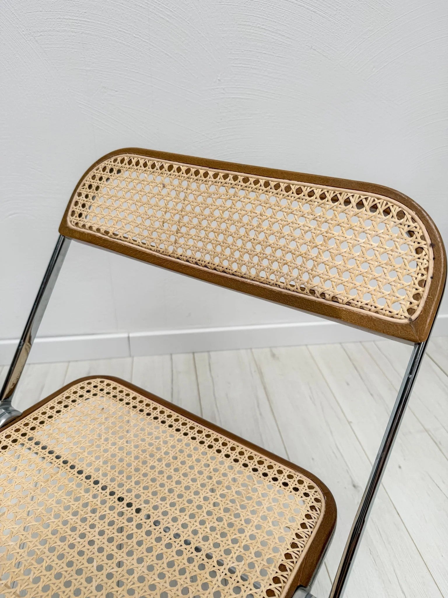 Plia_Folding_Chair_by_Giancarlo_Piretti_for_Anonima_Castelli,_Chrome,_Walnut_and_Cane_Wicker,_Italy,_1960s