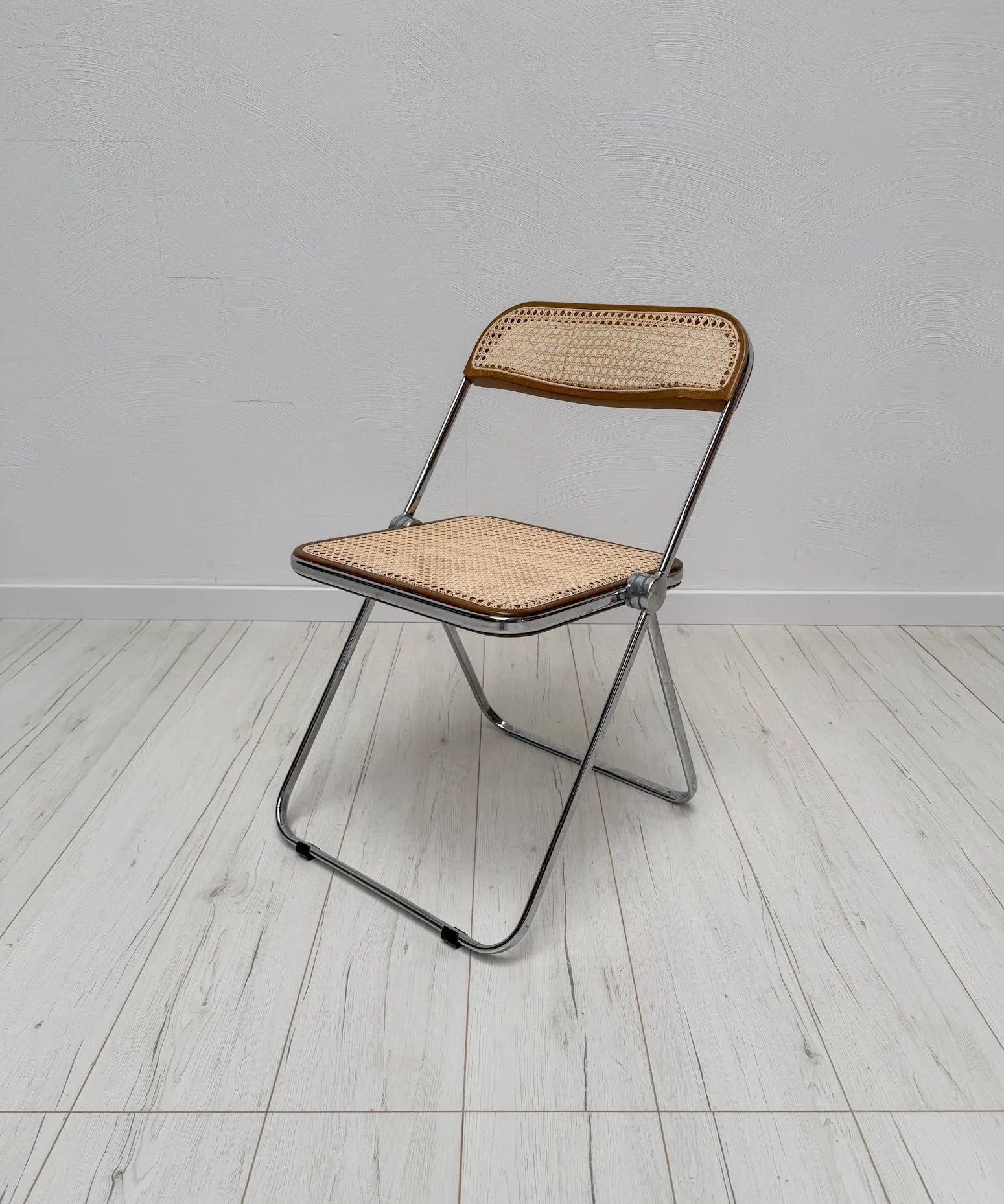 Plia_Folding_Chair_by_Giancarlo_Piretti_for_Anonima_Castelli,_Chrome,_Walnut_and_Cane_Wicker,_Italy,_1960s