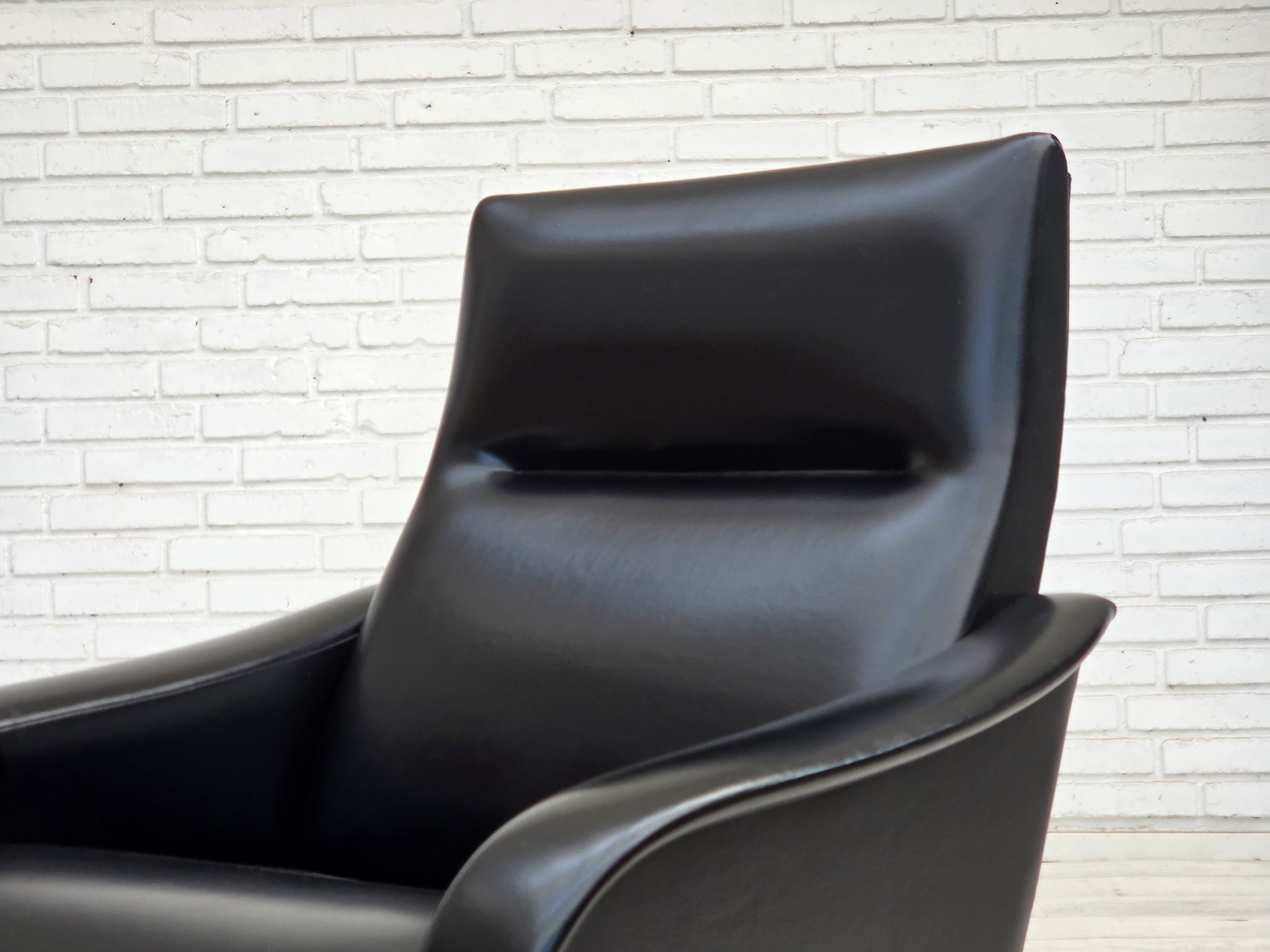 Danish_Black_Faux_Leather_Lounge_Chair_with_Teak_Legs,_1970s
