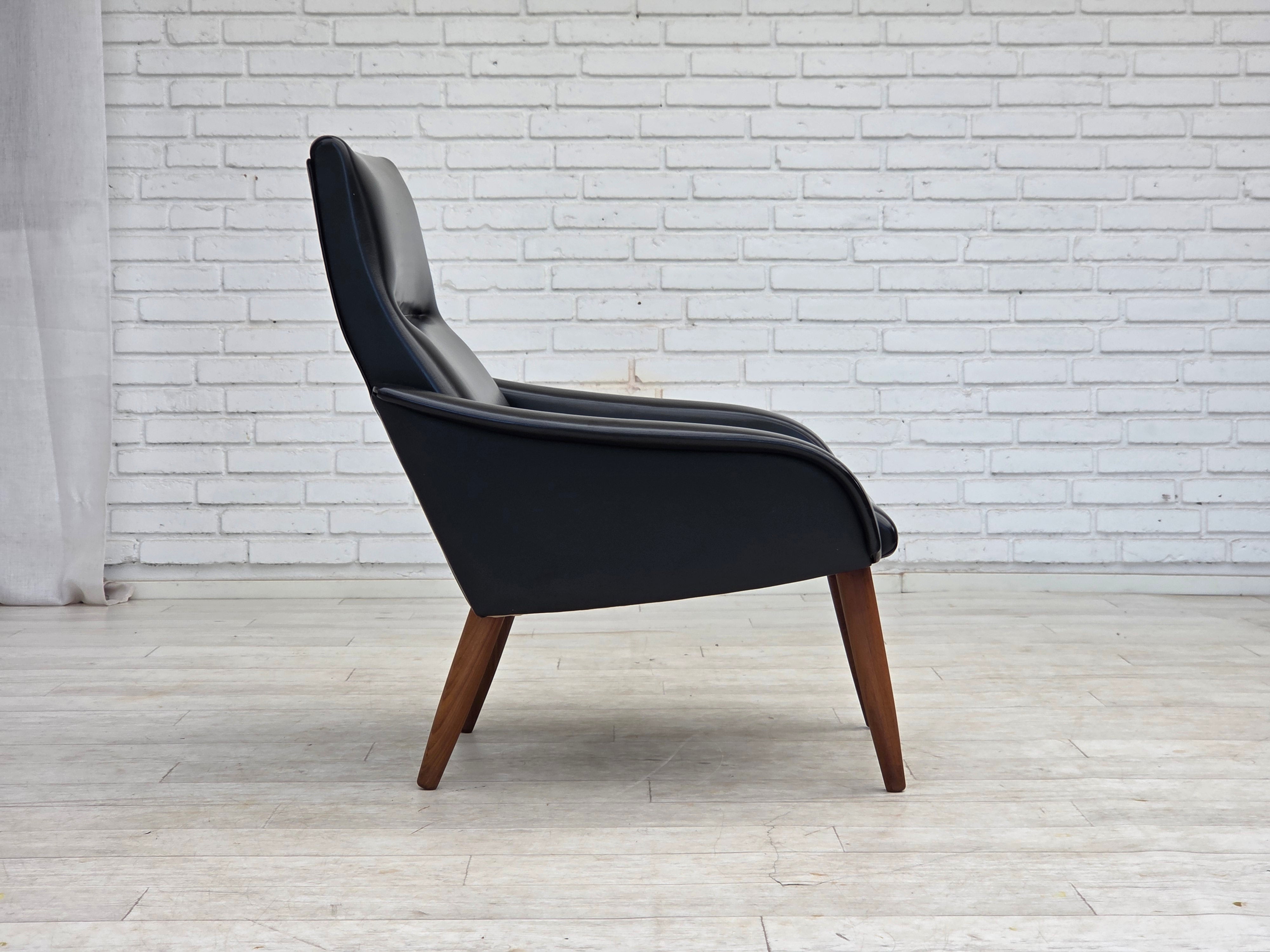 Danish_Black_Faux_Leather_Lounge_Chair_with_Teak_Legs,_1970s