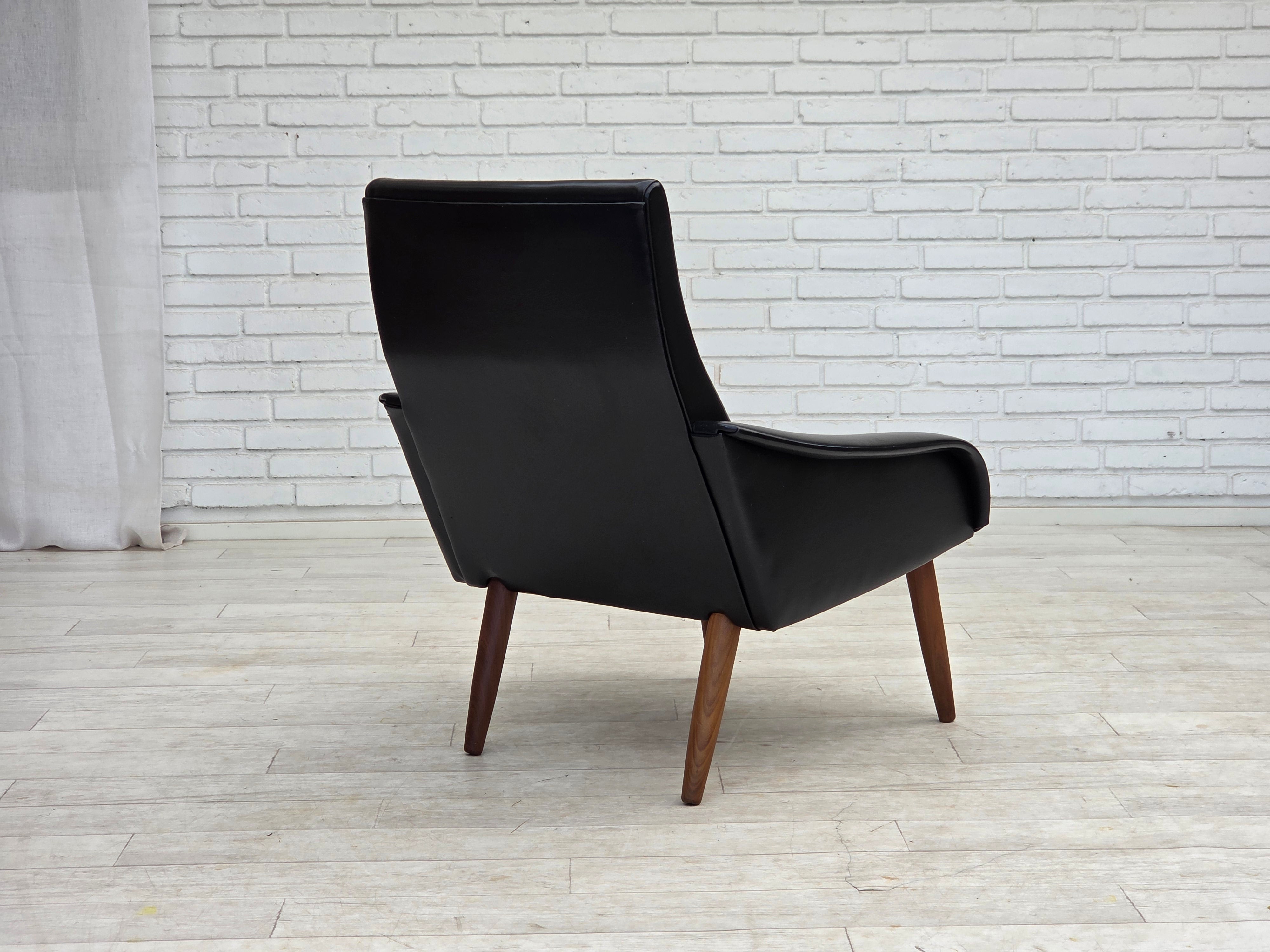 Danish_Black_Faux_Leather_Lounge_Chair_with_Teak_Legs,_1970s