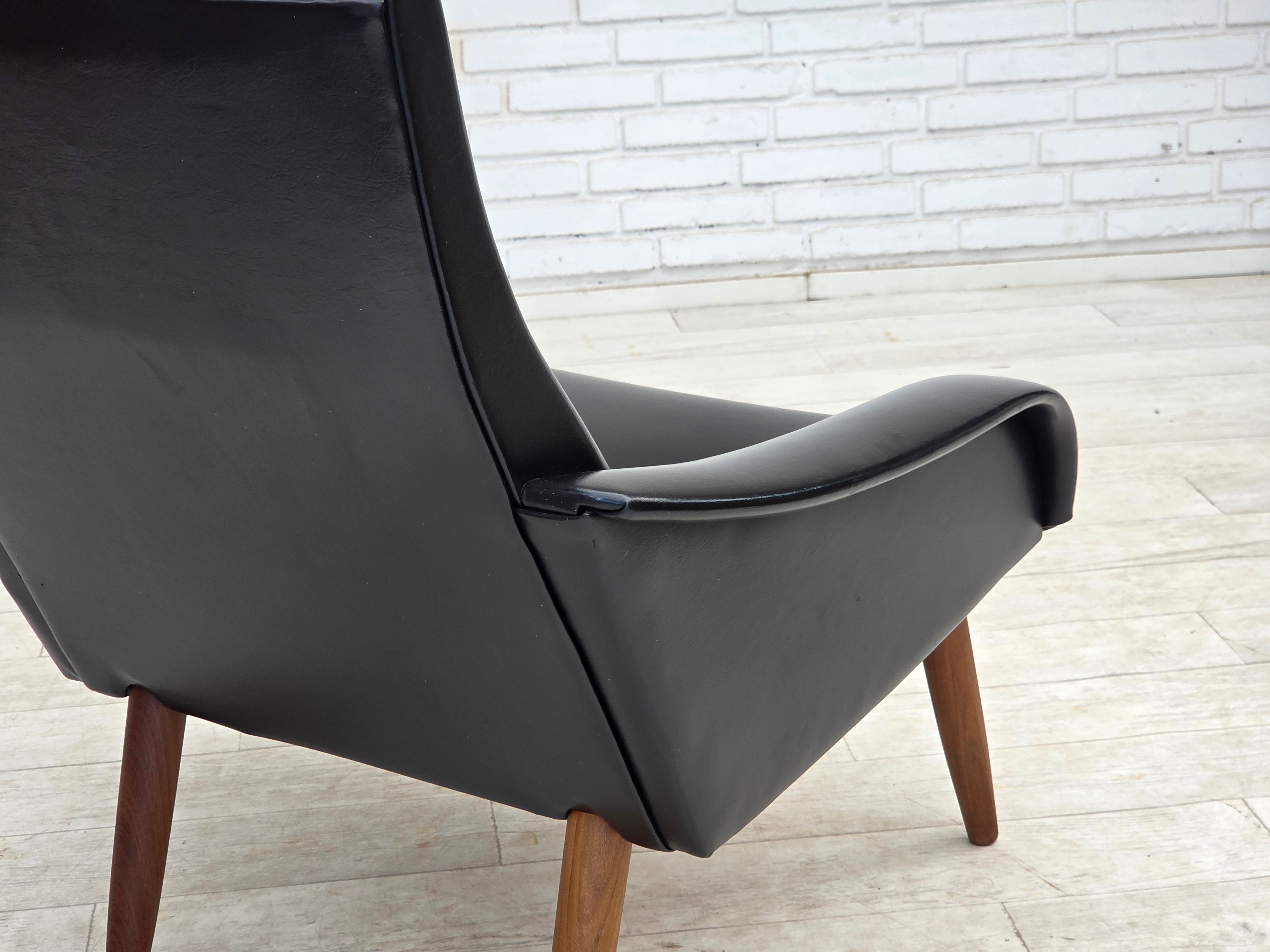 Danish_Black_Faux_Leather_Lounge_Chair_with_Teak_Legs,_1970s