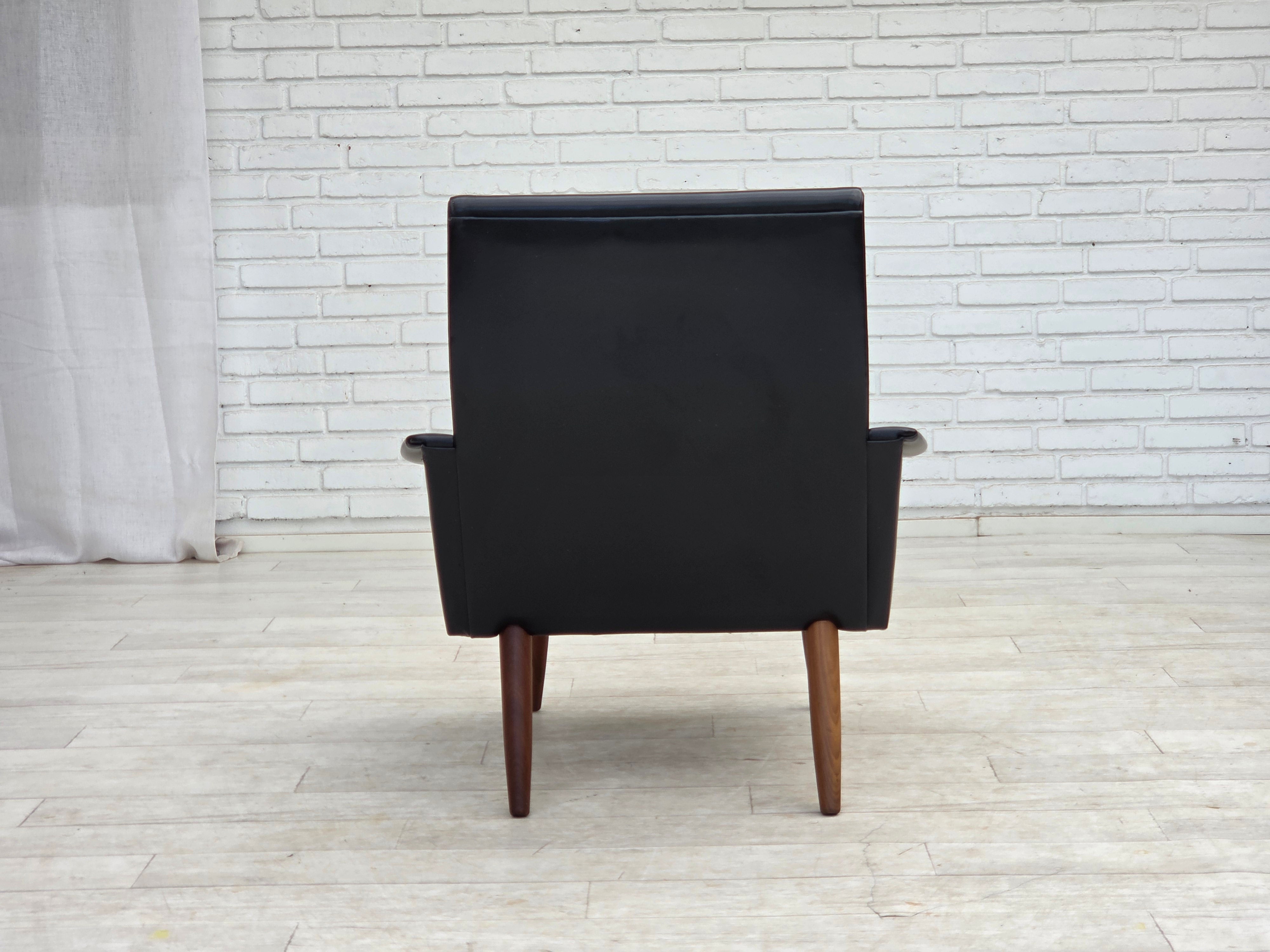 Danish_Black_Faux_Leather_Lounge_Chair_with_Teak_Legs,_1970s