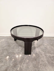 Mid-Century_Modern_Round_Coffee_Table_in_Smoked_Glass_with_Sculptural_Black_Tripod_Base,_1970s