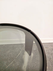 Mid-Century_Modern_Round_Coffee_Table_in_Smoked_Glass_with_Sculptural_Black_Tripod_Base,_1970s