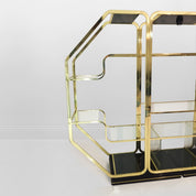 Italian_Octagonal_Brass_and_Glass_Display_Unit_in_Rega_Style,_1970s