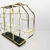 Italian_Octagonal_Brass_and_Glass_Display_Unit_in_Rega_Style,_1970s