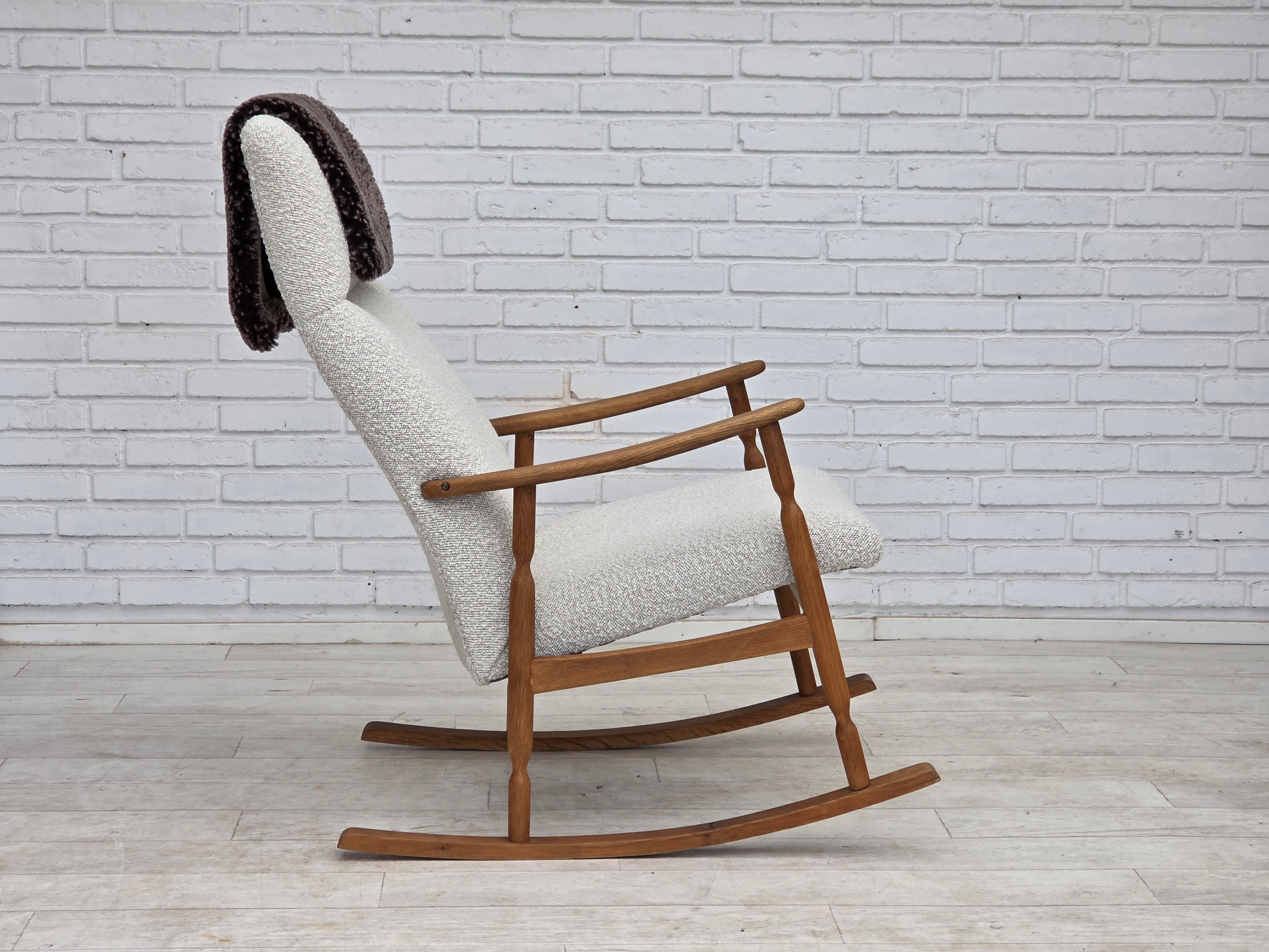 Scandinavian_High-Back_Rocking_Chair_in_Solid_Oak_with_White_Upholstery_and_Sheepskin_Pillow,_circa_1965–1970