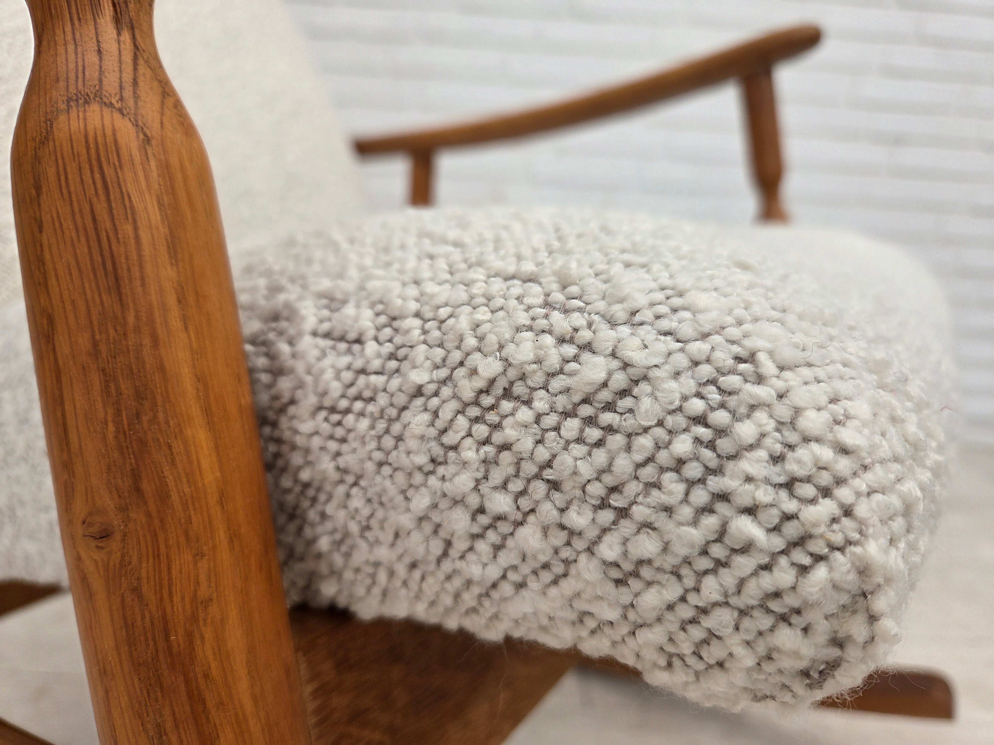 Scandinavian_High-Back_Rocking_Chair_in_Solid_Oak_with_White_Upholstery_and_Sheepskin_Pillow,_circa_1965–1970